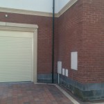 Cream roller door with canopy